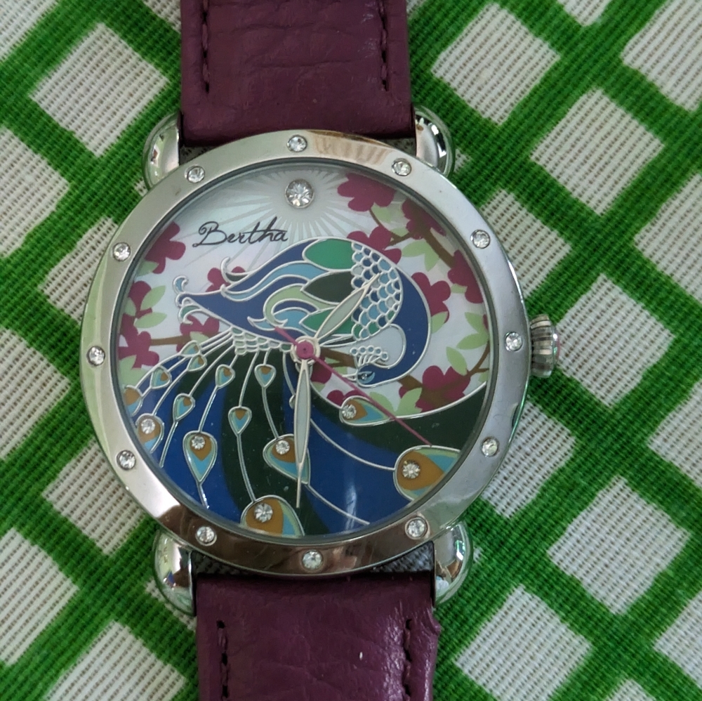 Bertha wristwatch. Large. Peacock NWOT.  New battery purple leather band.